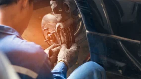 Man filling air in the tires of his car for safety and regular maintenance