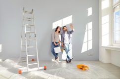 Young couple thinking about improvements they can make without violating their rental contract - Cheap renters insurance