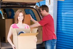 Couple of spouses taking their belongings to a storage unit - Acceptance, cheap renters insurance