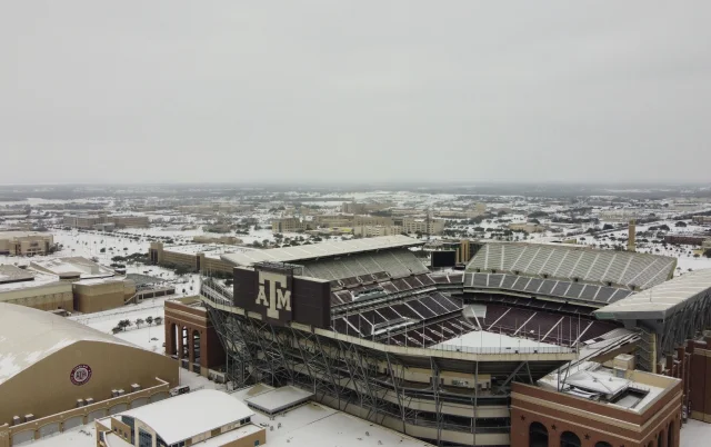 An aerial view of the Kyle Football Field covered in snow in College Station, Texas, USA – College Station, cheap car insurance in Texas