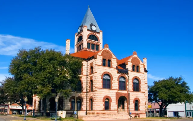 Erath County Courthouse with a clear blue sky in the background located in Stephenville, Texas, USA - Stephenville, cheap car insurance in Texas.