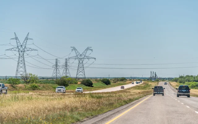 Highway road 84 near Snyder, Texas countryside with cars in traffic and power lines cables – Snyder, cheap car insurance in Texas