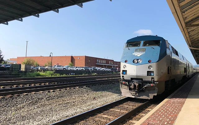 Amtrak passenger train arriving at quiet Altoona, PA station – Altoona, cheap car insurance in Pennsylvania